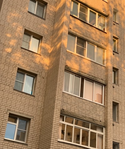 Brown concrete building during the day
